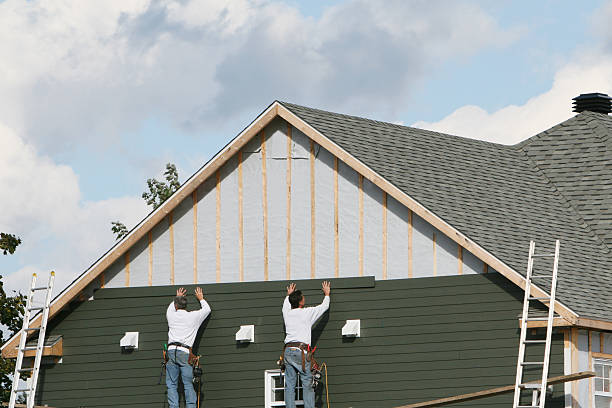 Professional Storm Damage Siding Repair technician working in Fairfield, PA